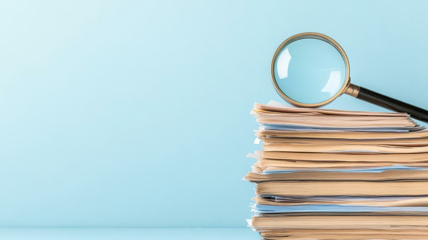 magnifying glass on paper