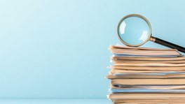 magnifying glass on paper