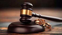 Gavel and wedding rings