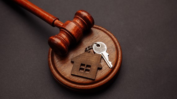 A gavel and a house