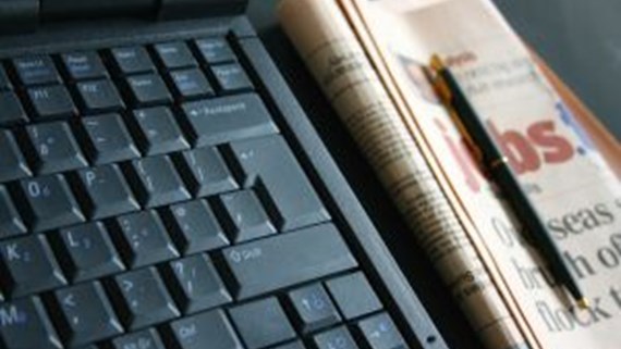 laptop and newspaper