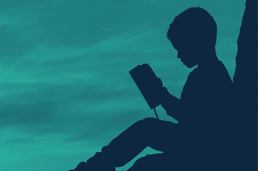Child reading a book