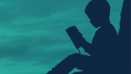 Child reading a book