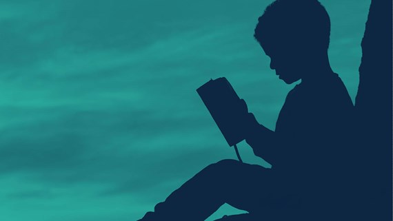 Child reading a book