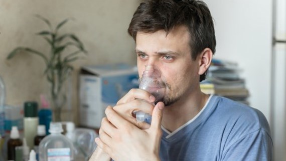man with inhaler