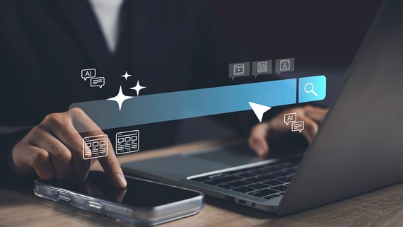 Smartphone and laptop displaying AI-powered search technology, illustrating Google's AI Overviews and new UK publisher controls introduced by the CMA.