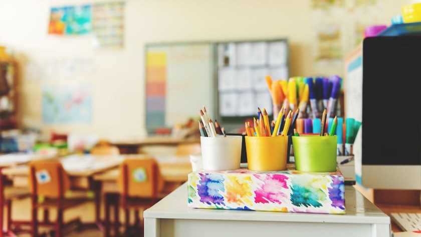 Early years classroom with colourful pencils, reflecting safe and supportive early learning practice