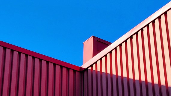 red building blue sky