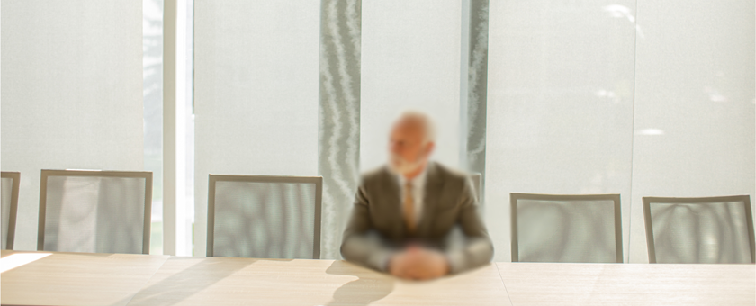 blurred man in boardroom